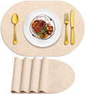ADRIMER Oval Placemats Set of 4, Wipeable Faux Leather, Beige