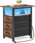 Vagusicc Nightstand with Charging Station and LED Lights, Narrow End Table, LED Night Stand with 3 Fabric Drawers for Bedroom, Small Bedside Table, Narrow Side Table for Small Spaces, Rustic Brown