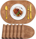 ADRIMER Oval Placemats Set of 6, Wipeable Faux Leather, Sandy Light Brown