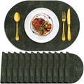 ADRIMER Oval Placemats Set of 12, Wipeable Faux Leather, Olive Green