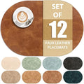 ADRIMER Oval Placemats Set of 12, Wipeable Faux Leather, Turmeric Brown